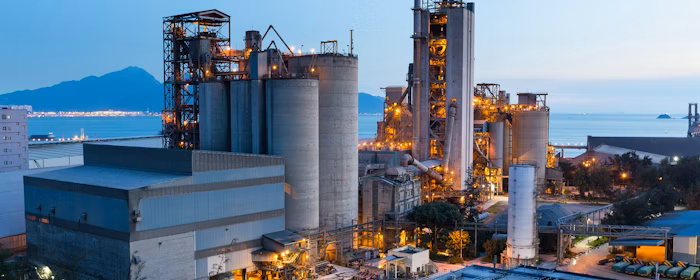 Industrial complex with large silos and towers