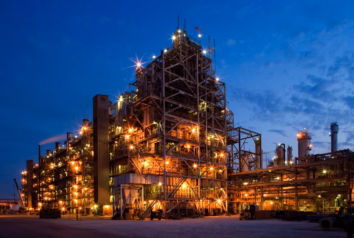 An illuminated industrial facility of Huntsman